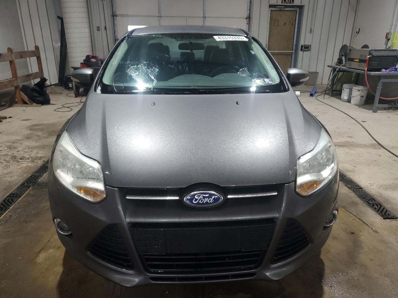 2014 Ford Focus VIN 1FADP3F24EL415759 Copart auction photo, rear end damage thumbnail 5