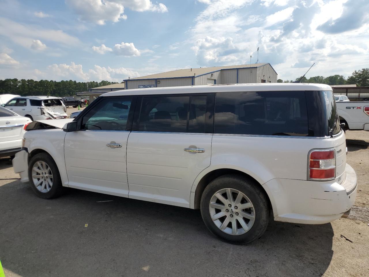 2009 Ford Flex VIN 2FMDK52C29BA11170 Copart auction photo, front end damage thumbnail 2