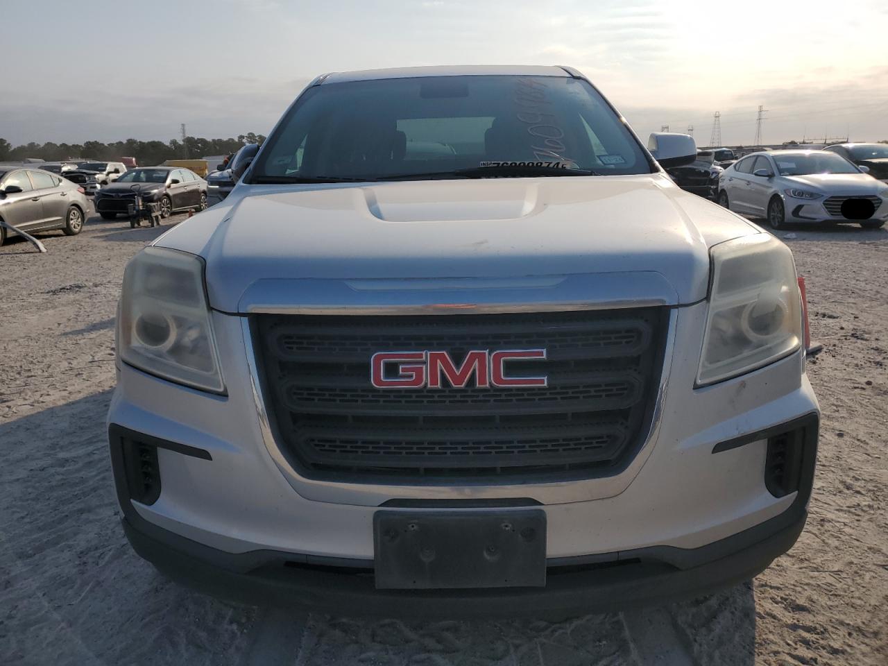 2017 GMC Terrain VIN 2GKALMEK6H6342833 Copart auction photo, side damage thumbnail 5