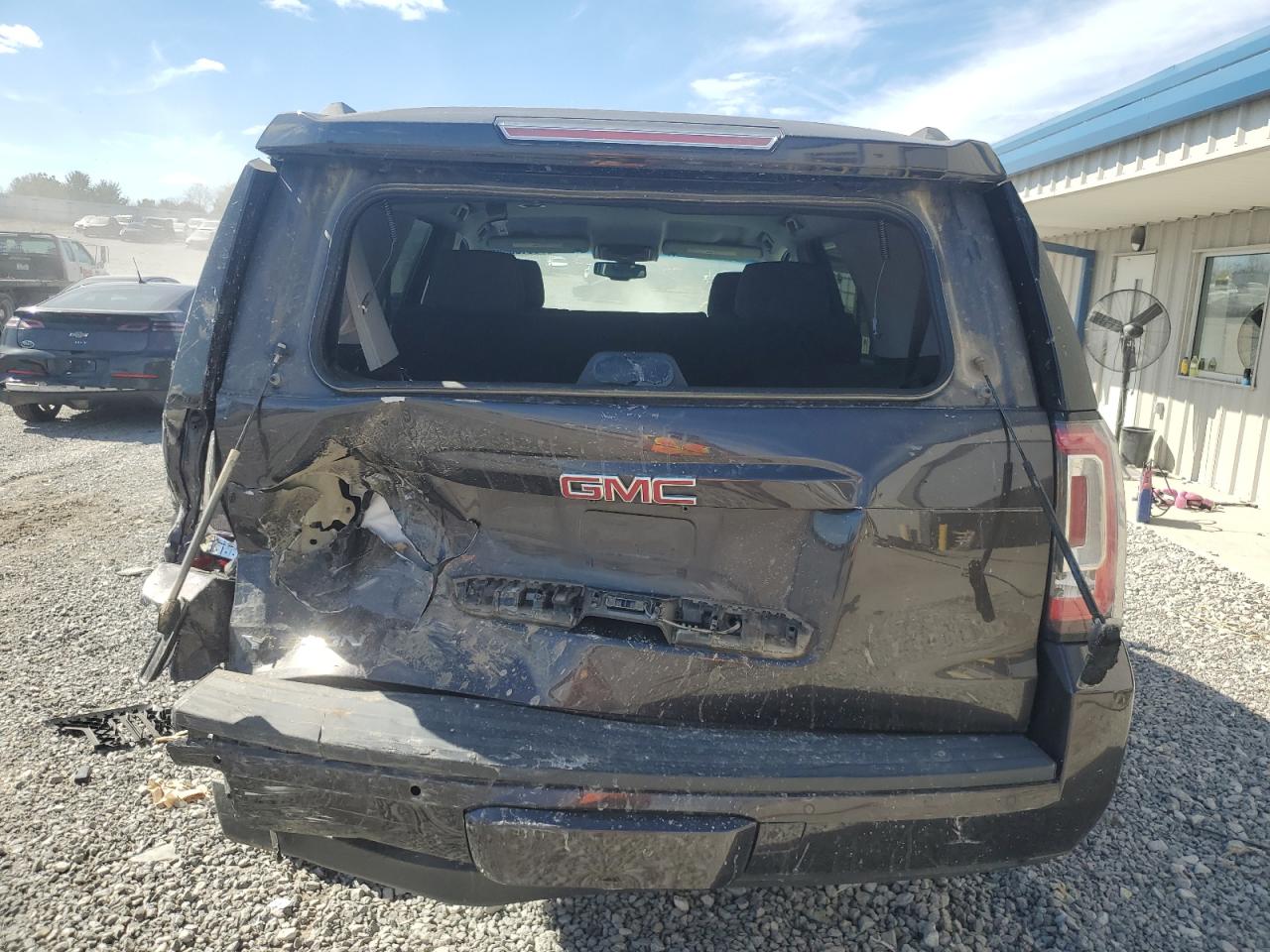 2016 GMC Yukon VIN 1GKS2AKC1GR402880 Copart auction photo, rear end / side damage thumbnail 6