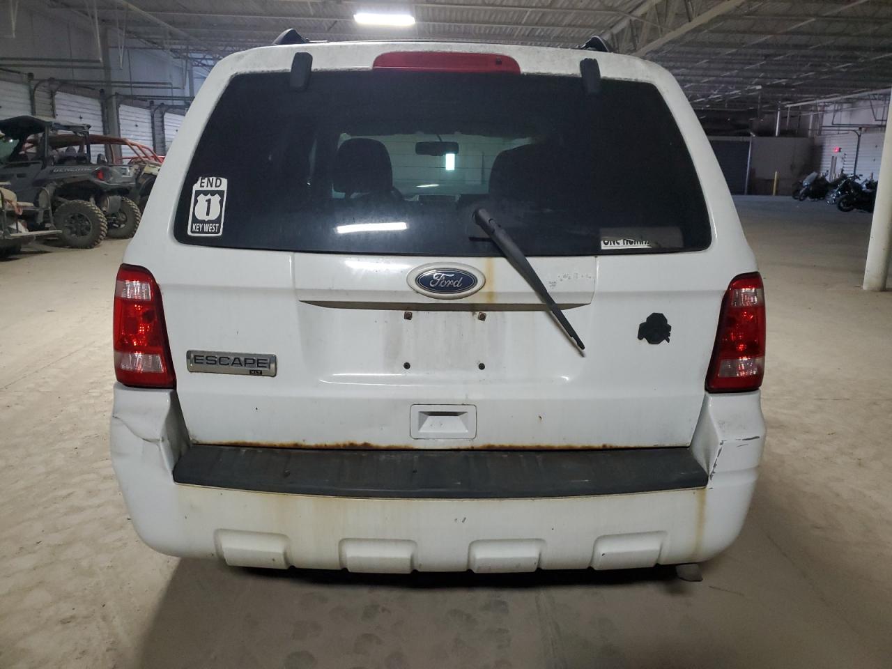2010 Ford Escape VIN 1FMCU0D70AKC51255 Copart auction photo, minor dent/scratches damage thumbnail 6