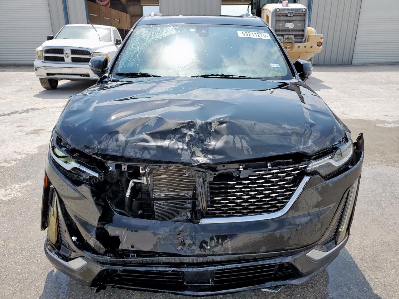2020 Cadillac XT6 VIN 1GYKPCRSXLZ104502 Copart auction photo, front end / side damage thumbnail 5