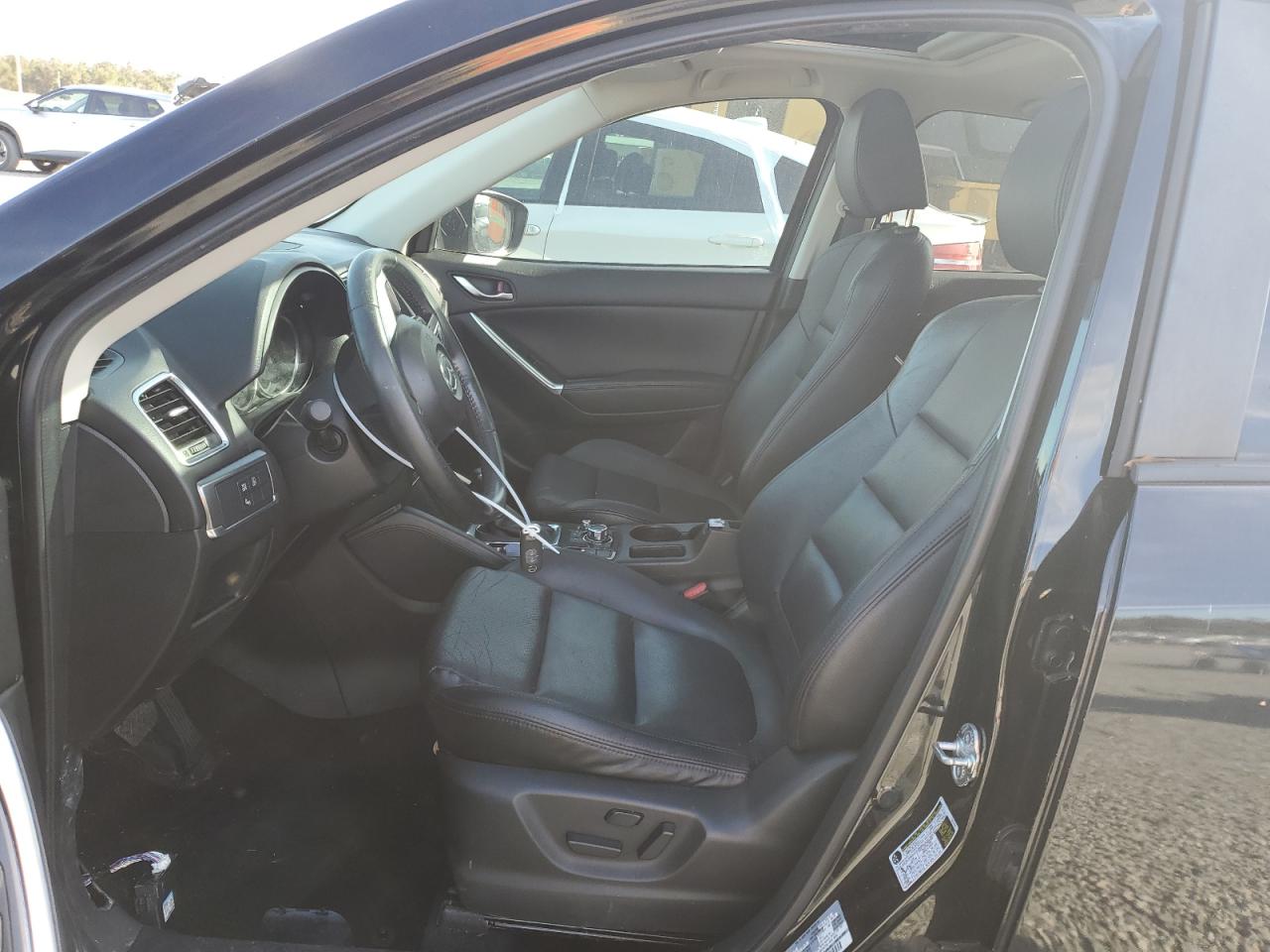2016 Mazda CX-5 VIN JM3KE2DY5G0696281 Copart auction photo, water/flood damage thumbnail 7