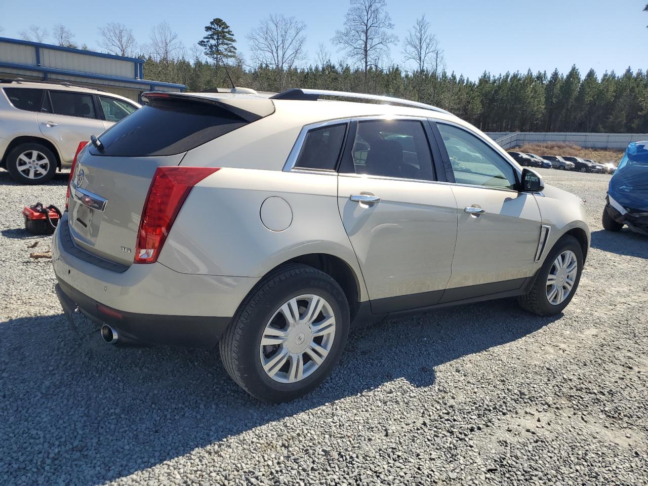 2015 Cadillac SRX VIN 3GYFNBE39FS621095 Copart auction photo, rear end damage thumbnail 3