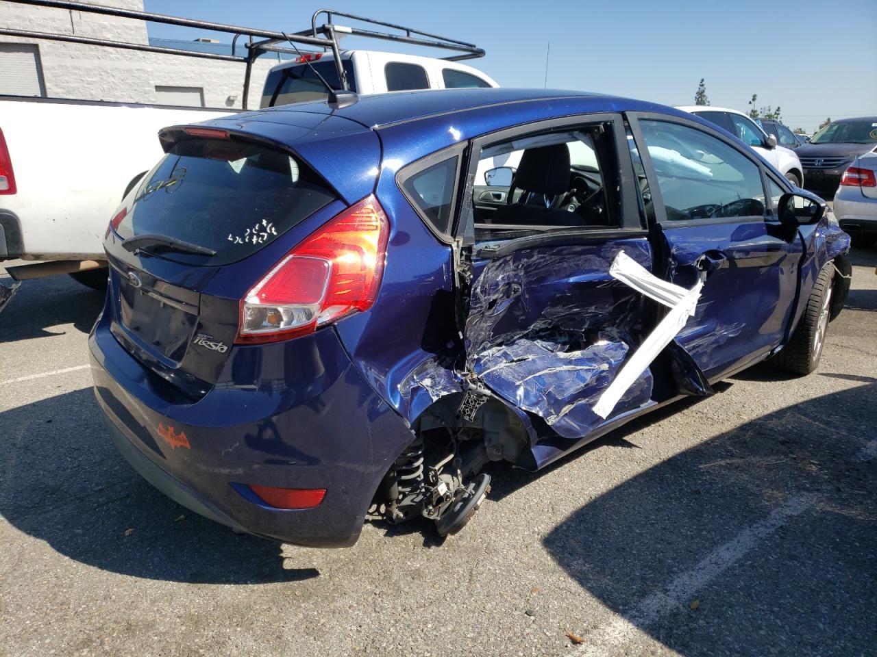 2016 Ford Fiesta VIN 3FADP4EJ4GM148767 Copart auction photo, side / undercarriage damage thumbnail 3
