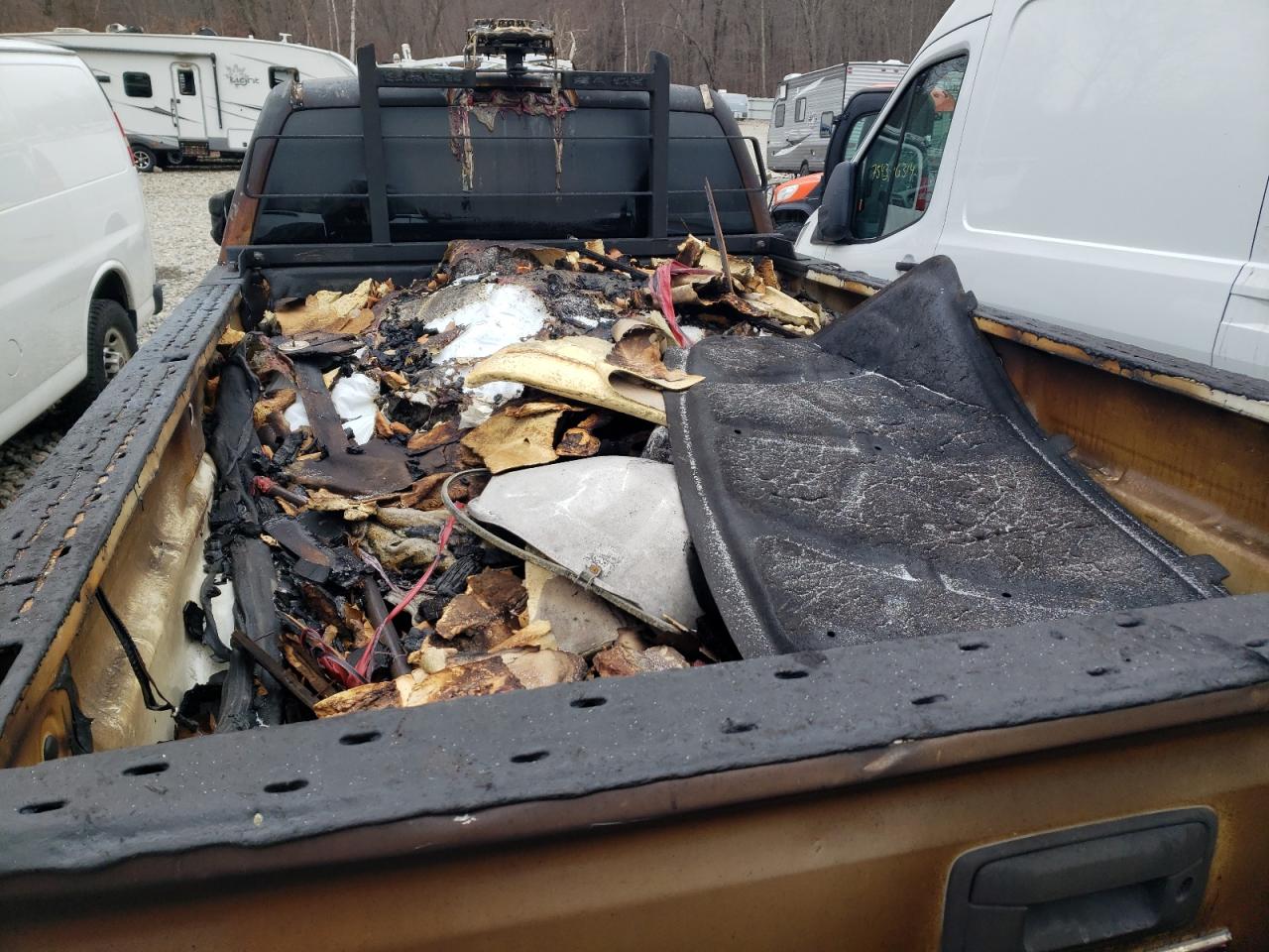 2015 GMC Sierra VIN 1GT02XEG9FZ141579 Copart auction photo, burn / burn - engine damage thumbnail 11