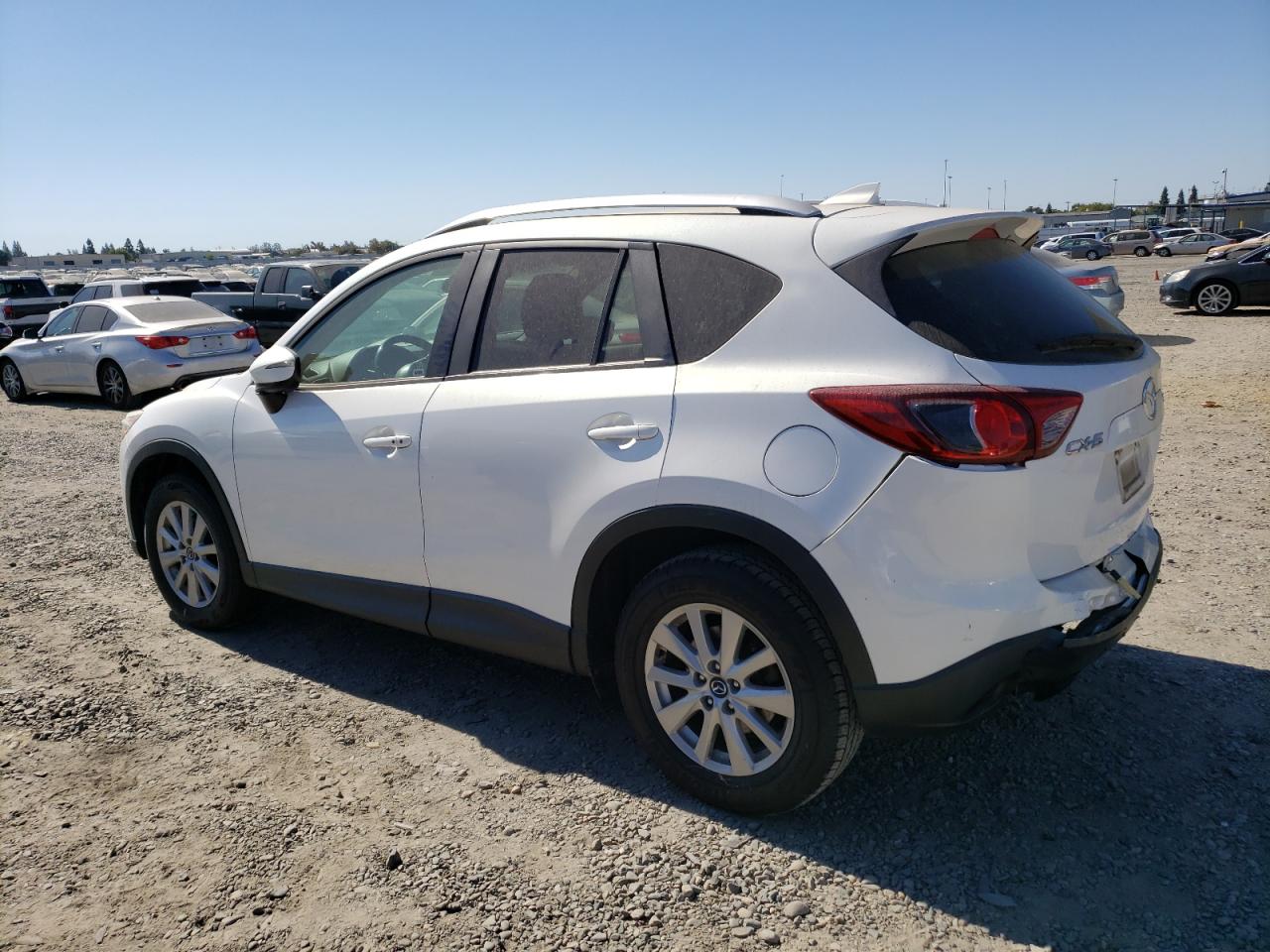 2016 Mazda CX-5 VIN JM3KE2CY2G0791883 Copart auction photo, rear end damage thumbnail 2