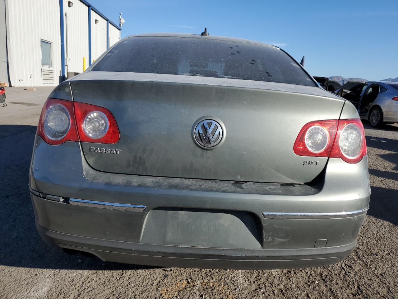 2007 Volkswagen Passat VIN WVWAK73C57P141581 Copart auction photo, side / front end damage thumbnail 6