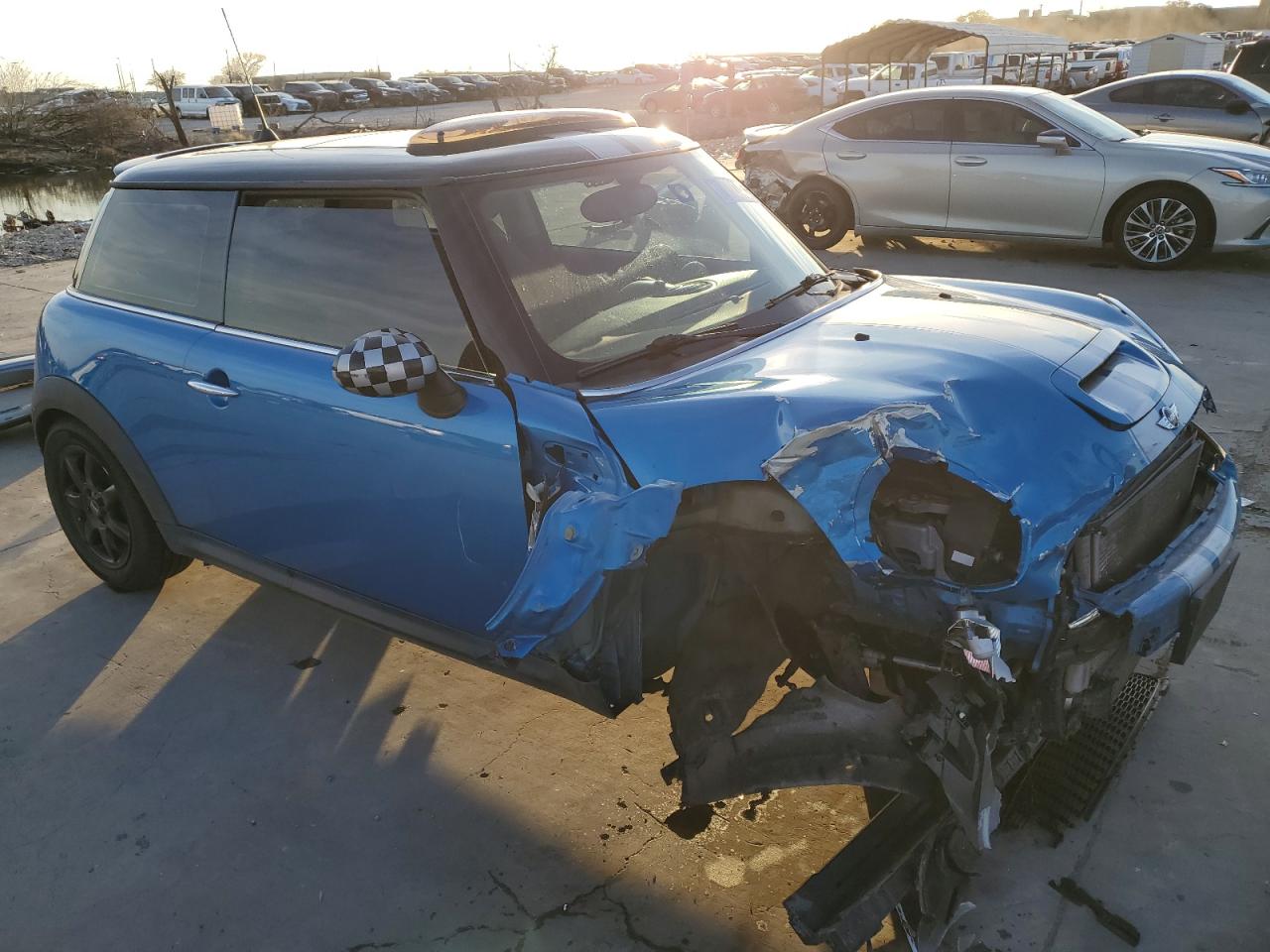 2009 MINI Cooper VIN WMWMF735X9TW80627 Copart auction photo, front end / undercarriage damage thumbnail 4