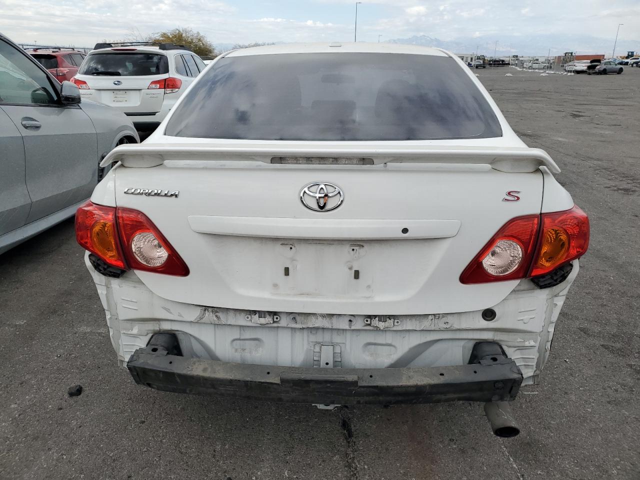 2010 Toyota Corolla VIN 2T1BU4EE9AC528233 Copart auction photo, rear end damage thumbnail 6