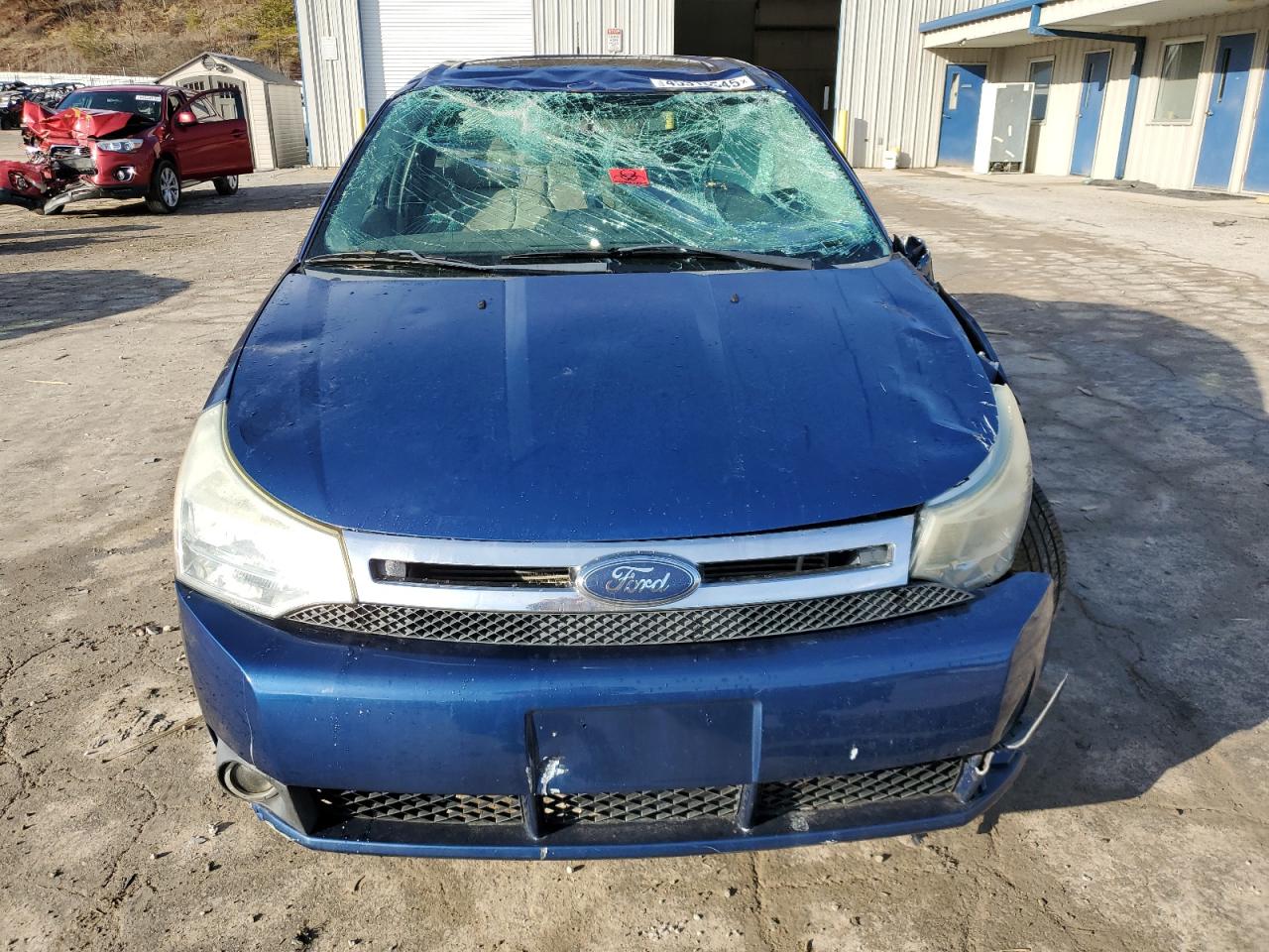 2009 Ford Focus VIN 1FAHP37N99W235403 Copart auction photo, all over damage thumbnail 5