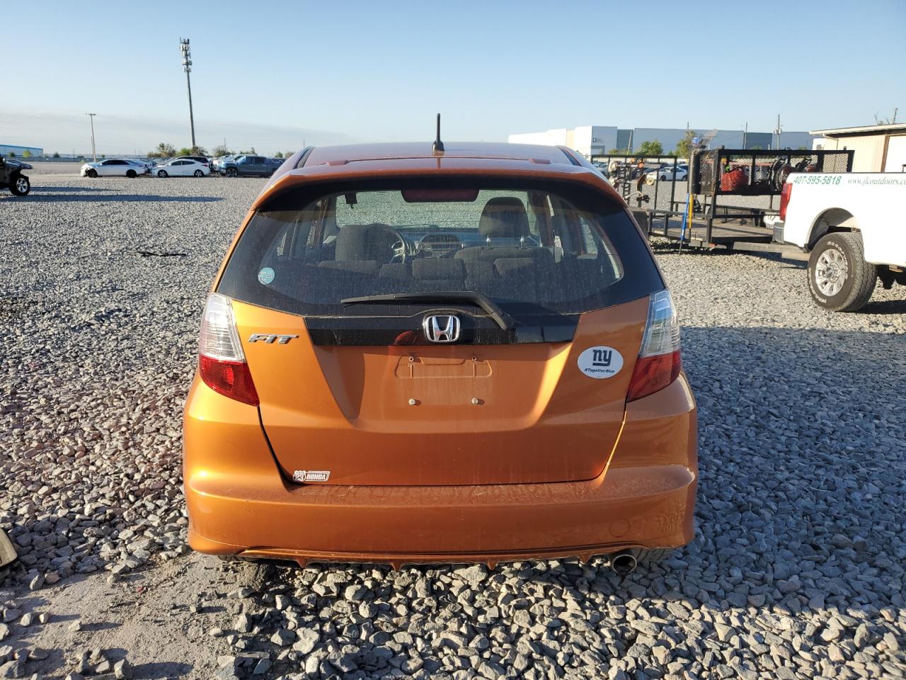 2010 Honda Fit VIN JHMGE8H41AC016227 Copart auction photo, side / front end damage thumbnail 6