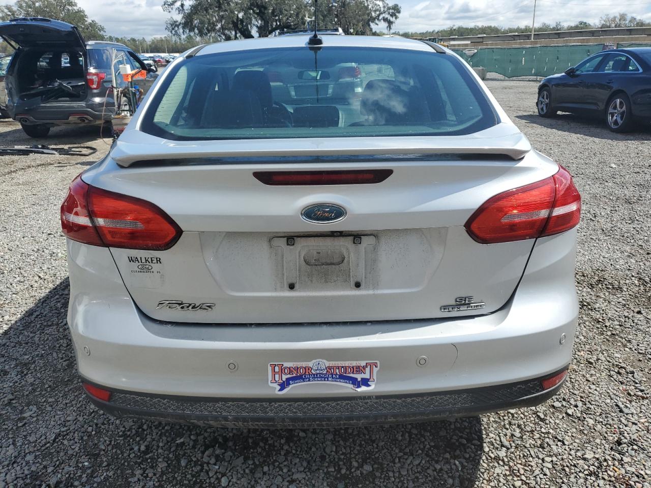 2015 Ford Focus VIN 1FADP3F2XFL267781 Copart auction photo, side damage thumbnail 6