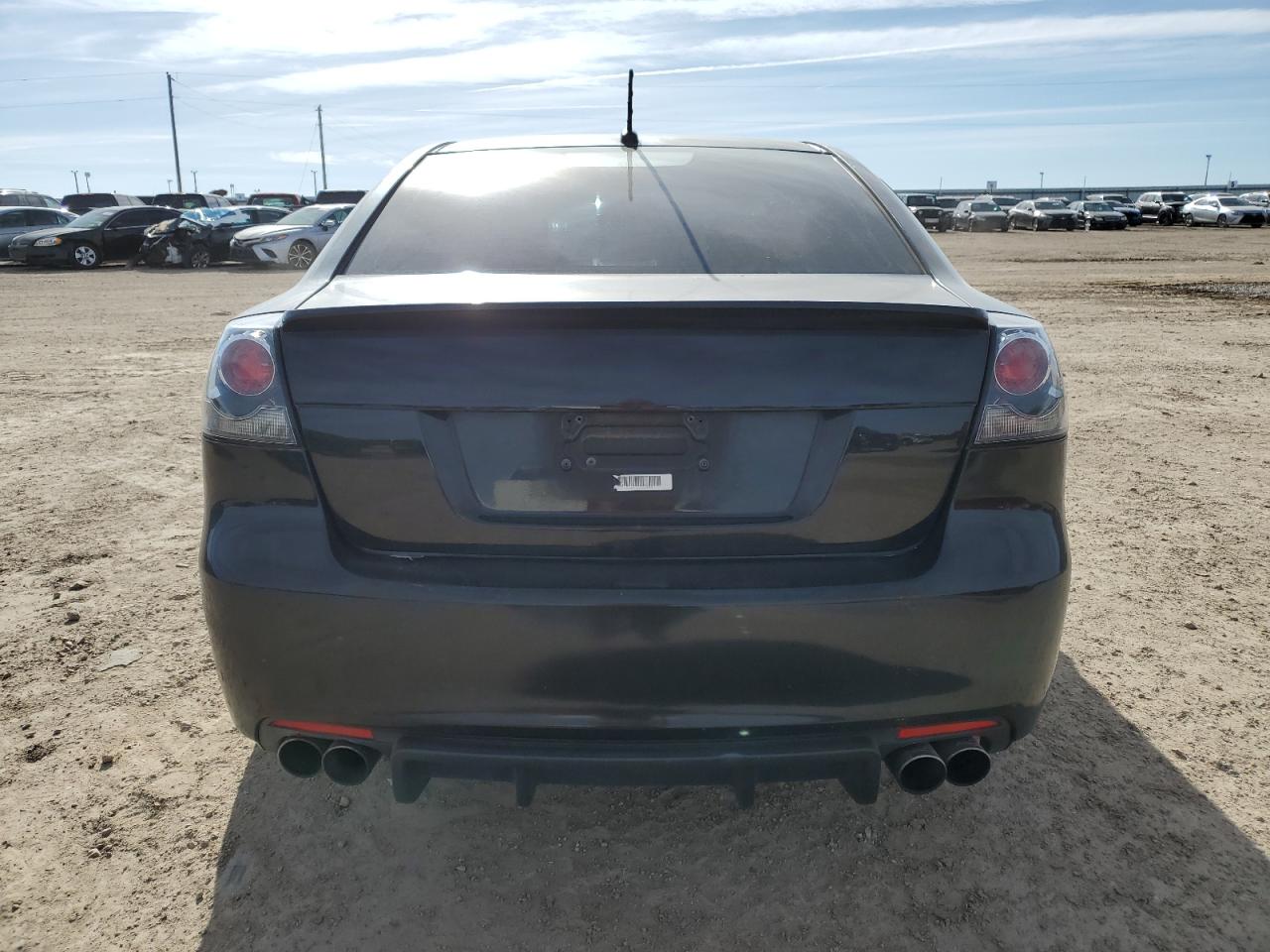 2009 Pontiac G8 VIN 6G2EC57Y99L195895 Copart auction photo, side / minor dent/scratches damage thumbnail 6
