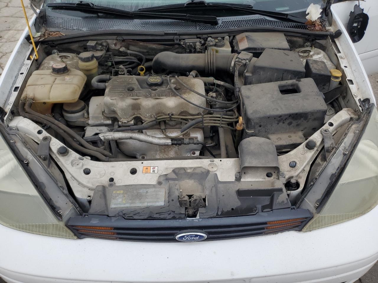 2003 Ford Focus VIN 1FAFP34P93W226284 Copart auction photo, all over damage thumbnail 11