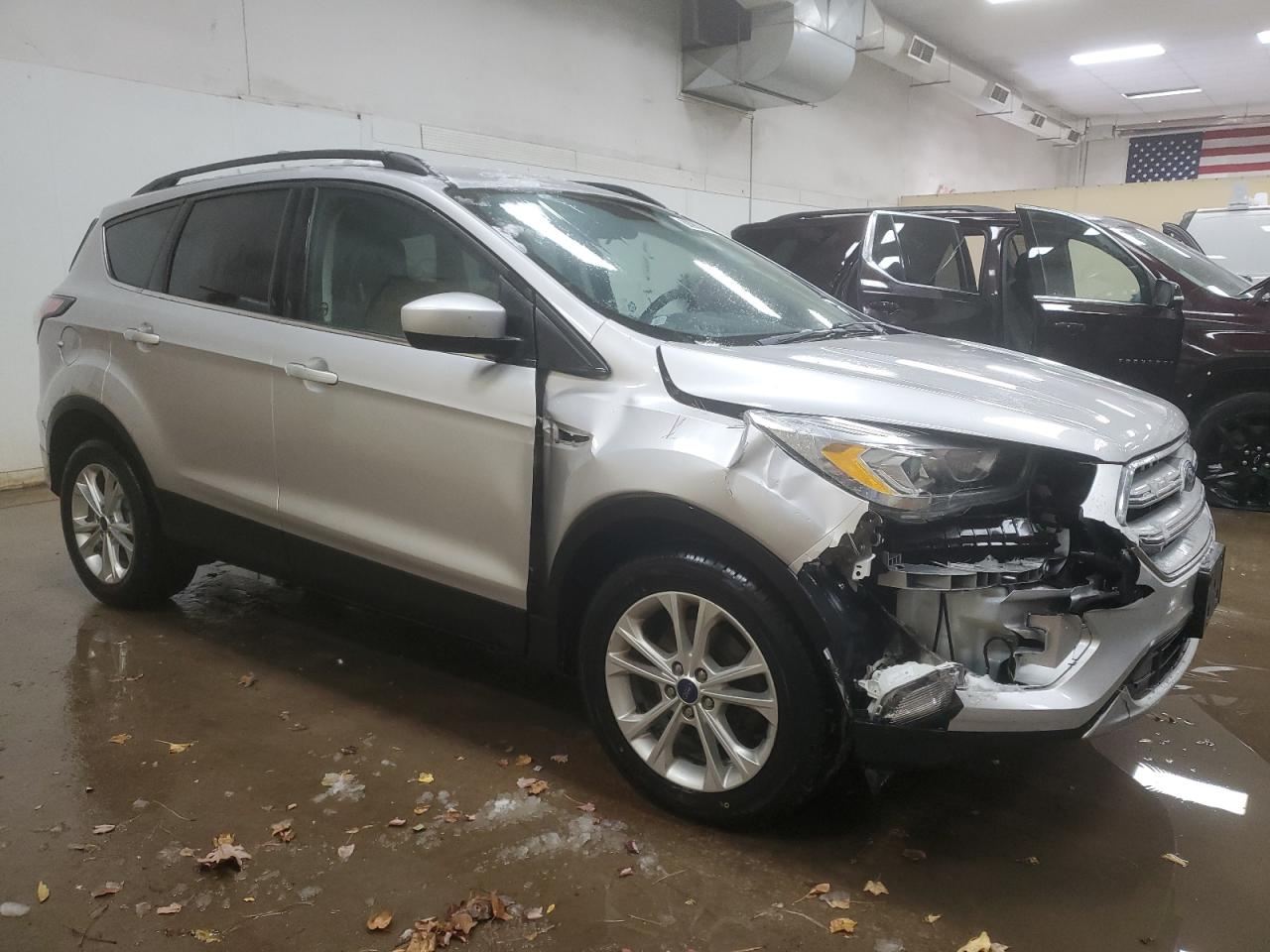 2017 Ford Escape VIN 1FMCU0GD0HUB16518 Copart auction photo, front end / side damage thumbnail 4