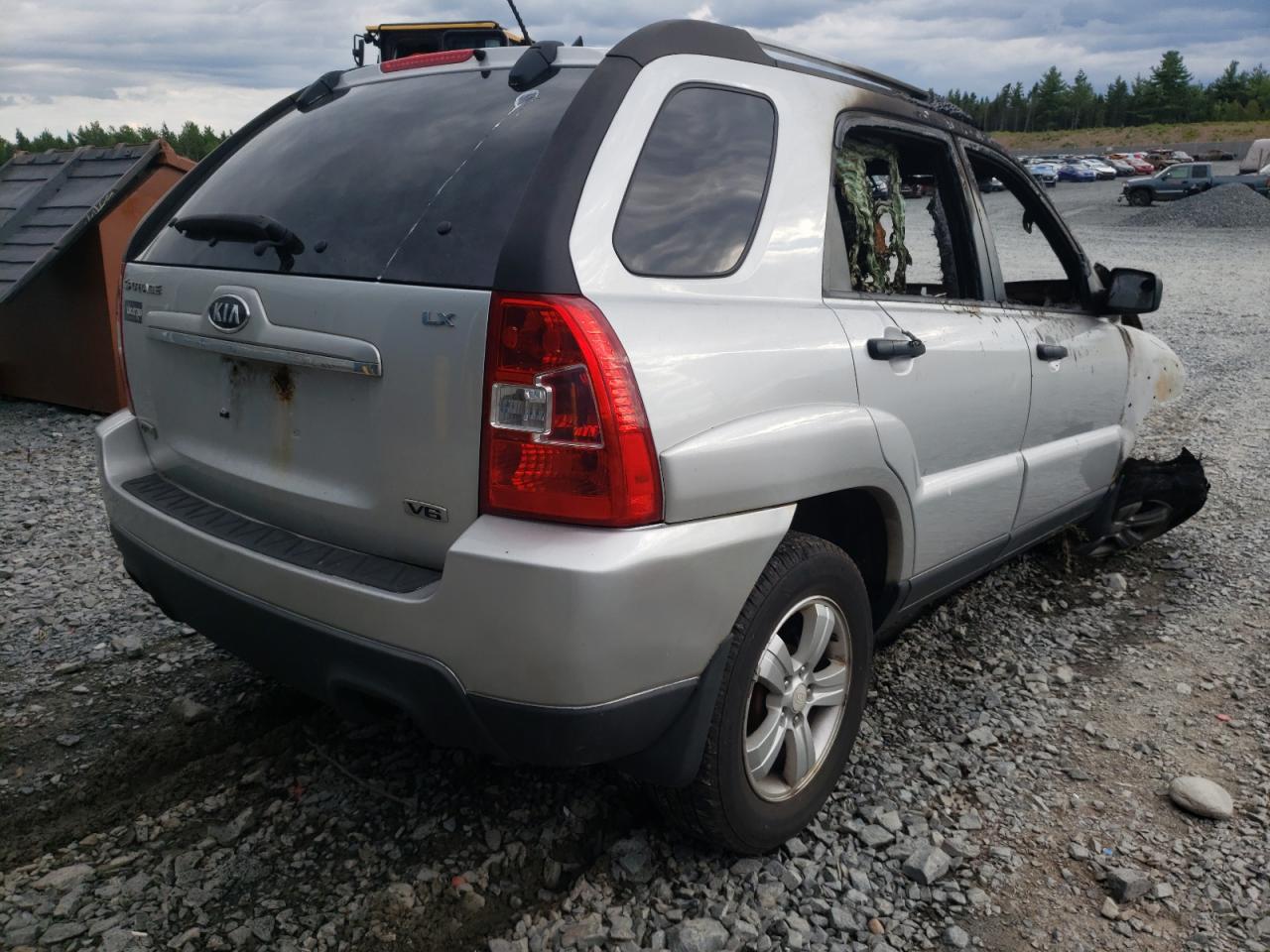 2009 KIA Sportage VIN KNDJE723997602549 Copart auction photo, burn damage thumbnail 4