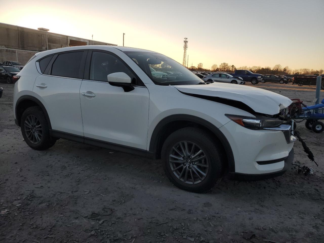 2019 Mazda CX-5 VIN JM3KFACMXK1615820 Copart auction photo, front end / minor dent/scratches damage thumbnail 4