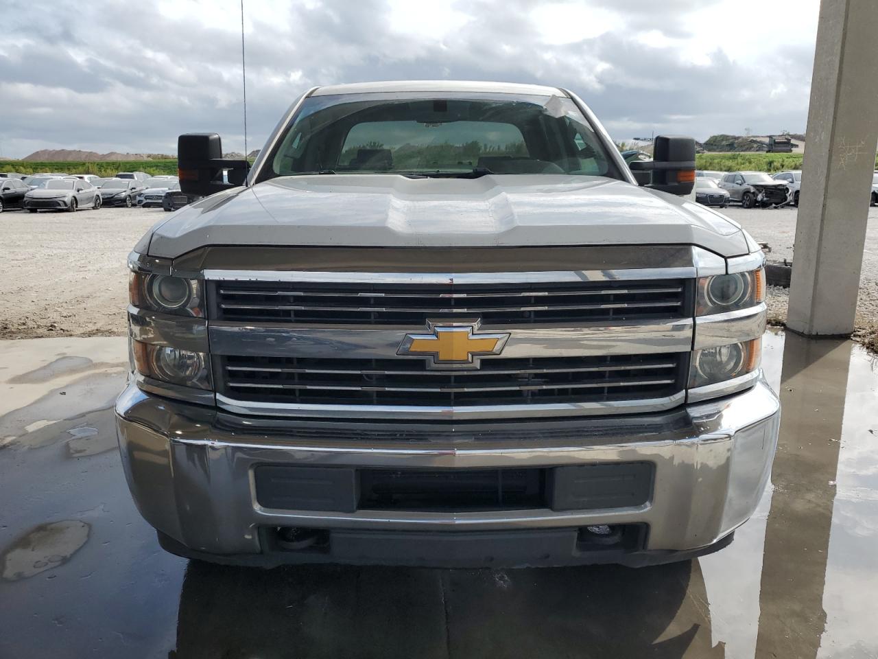 2016 Chevrolet Silverado VIN 1GC1CUEG5GF307583 Copart auction photo, side / minor dent/scratches damage thumbnail 5