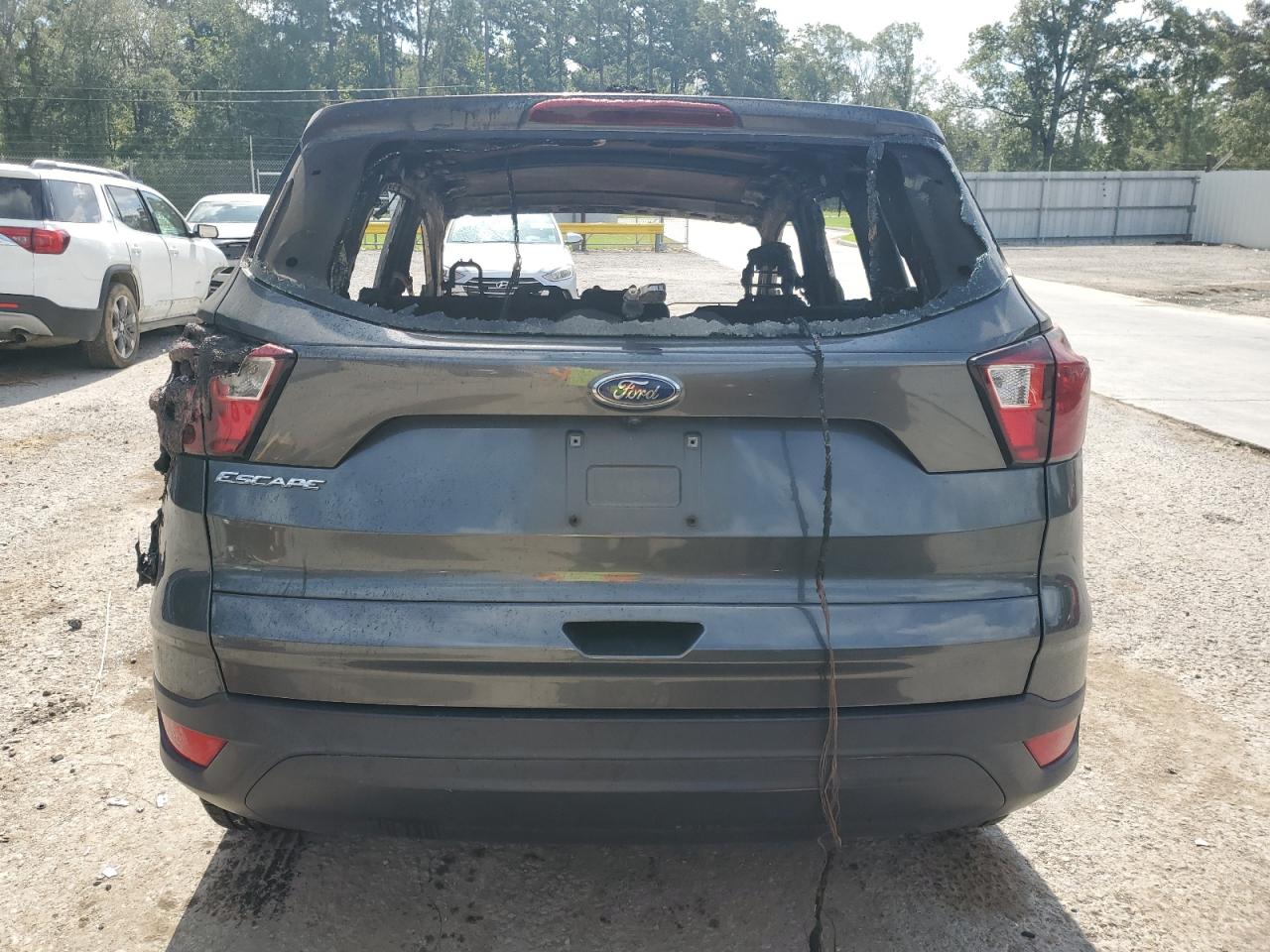 2019 Ford Escape VIN 1FMCU0F76KUC19946 Copart auction photo, burn damage thumbnail 6