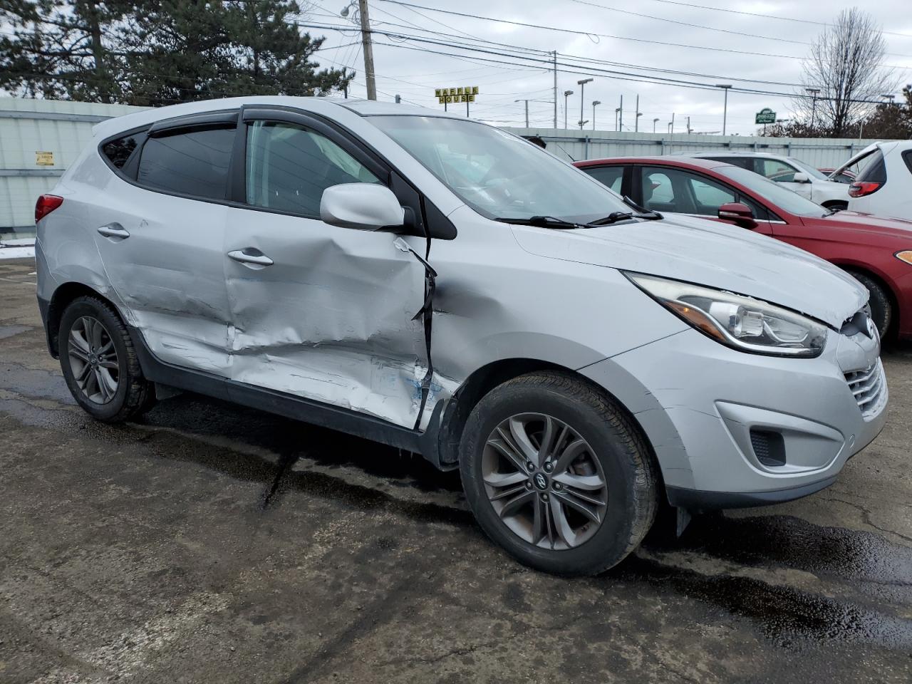 2015 Hyundai Tucson VIN KM8JTCAF8FU017996 Copart auction photo, all over / undercarriage damage thumbnail 4