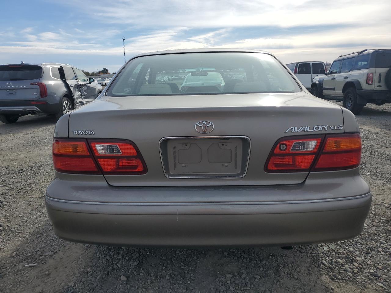 1999 Toyota Avalon VIN 4T1BF18B7XU332759 Copart auction photo, front end / side damage thumbnail 6