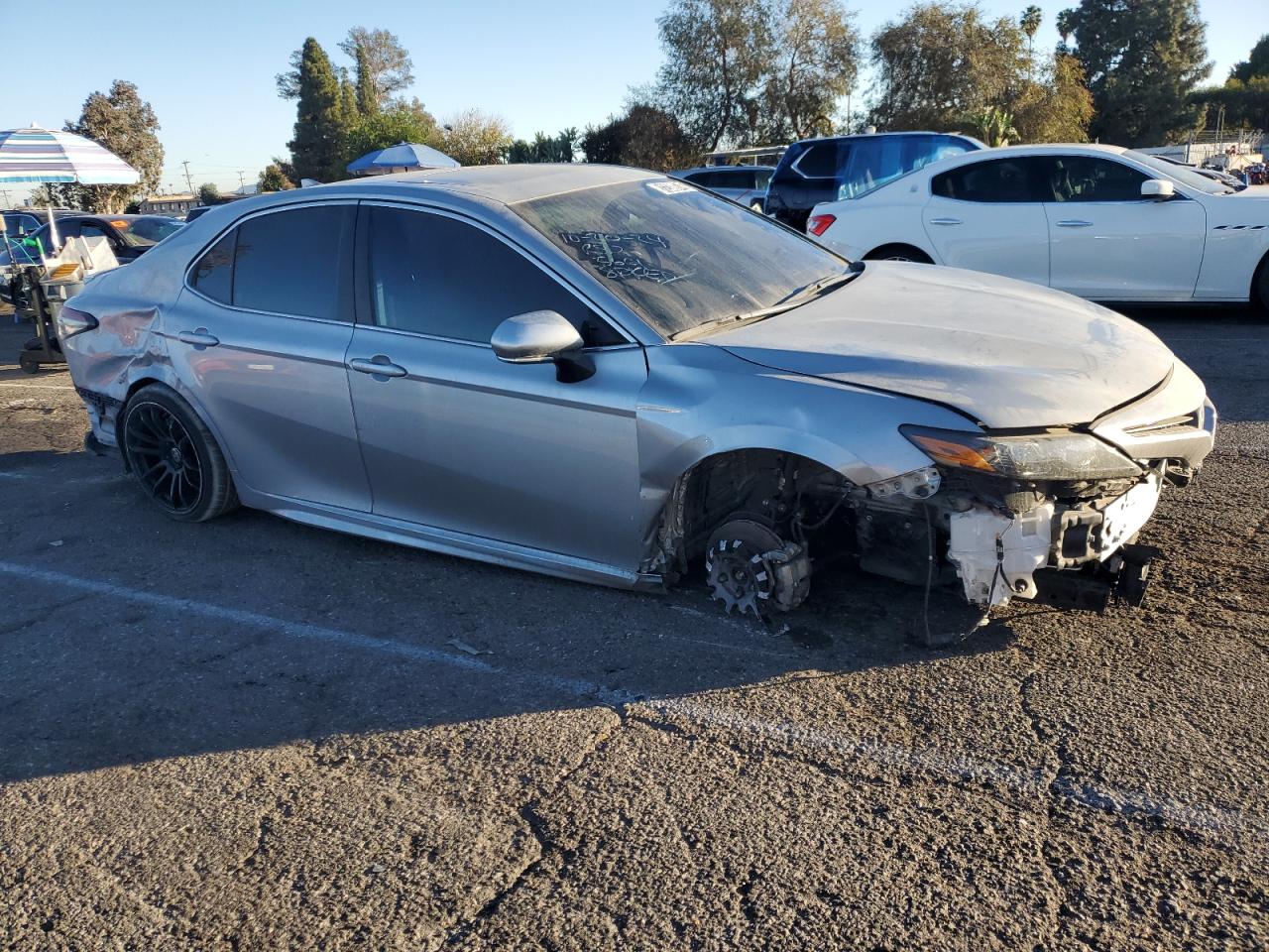 2023 Toyota Camry VIN 4T1S31AK3PU055661 Copart auction photo, front end / rear end damage thumbnail 4