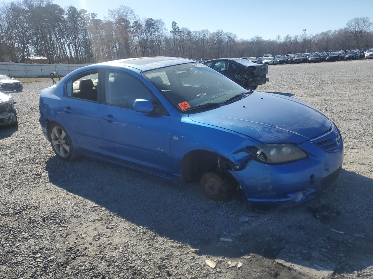 2005 Mazda 3 VIN JM1BK323651235631 Copart auction photo, front end / rear end damage thumbnail 4