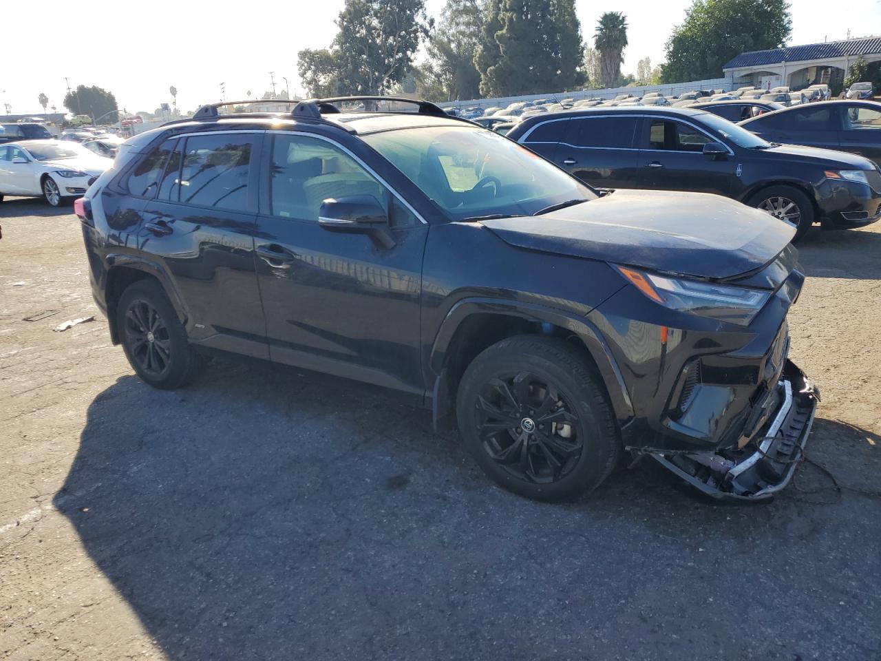 2022 Toyota RAV 4 VIN JTM16RFV4ND077979 Copart auction photo, front end / minor dent/scratches damage thumbnail 4