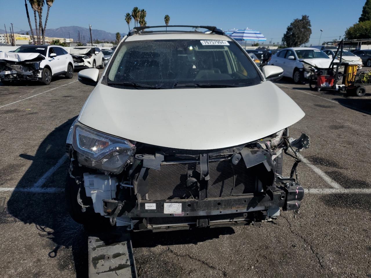 2016 Toyota RAV 4 VIN JTMYFREV4GD085051 Copart auction photo, front end damage thumbnail 5