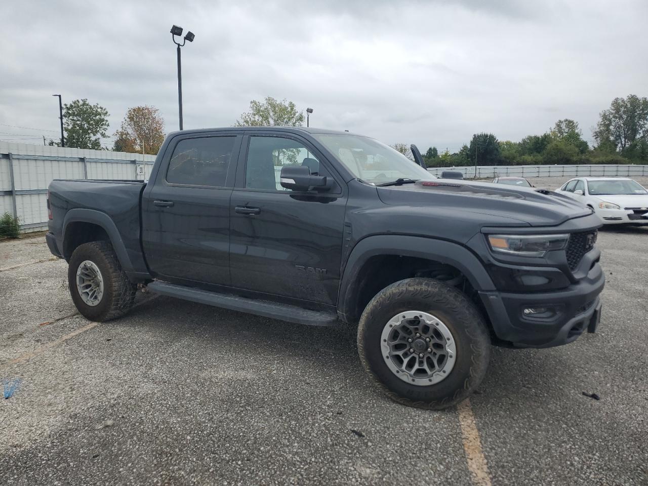 2021 RAM 1500 VIN 1C6SRFU91MN902652 Copart auction photo, vandalism damage thumbnail 4