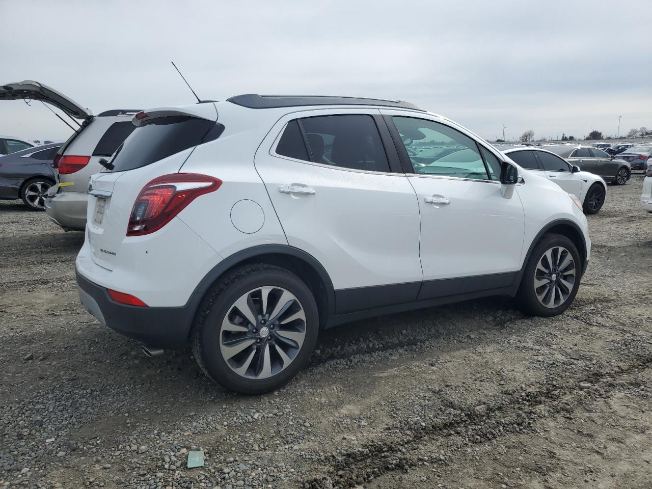 2020 Buick Encore VIN KL4CJCSB6LB061401 Copart auction photo, side / front end damage thumbnail 3