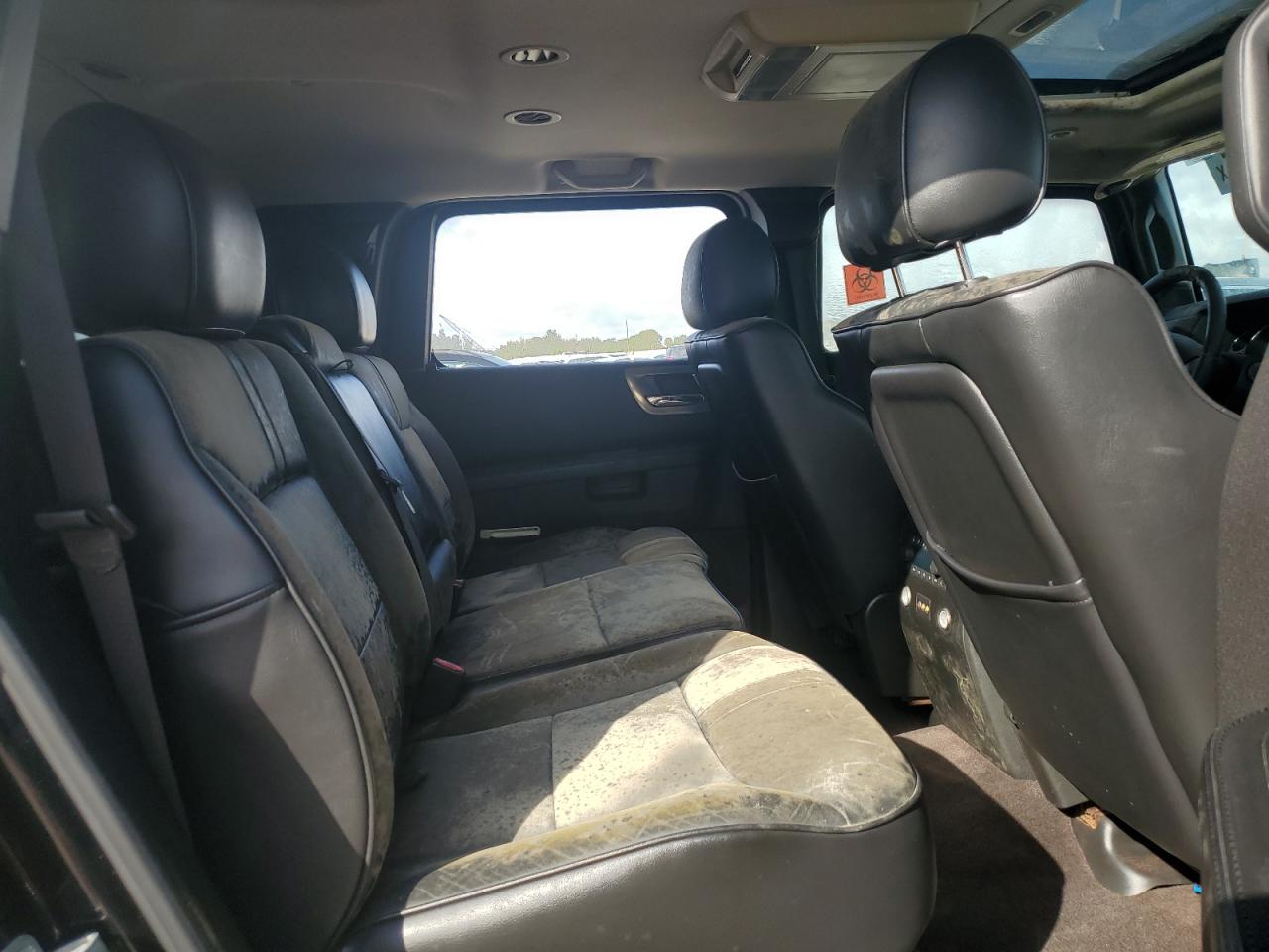 2009 Hummer H2 VIN 5GRGN83269H100421 Copart auction photo, water/flood / minor dent/scratches damage thumbnail 11