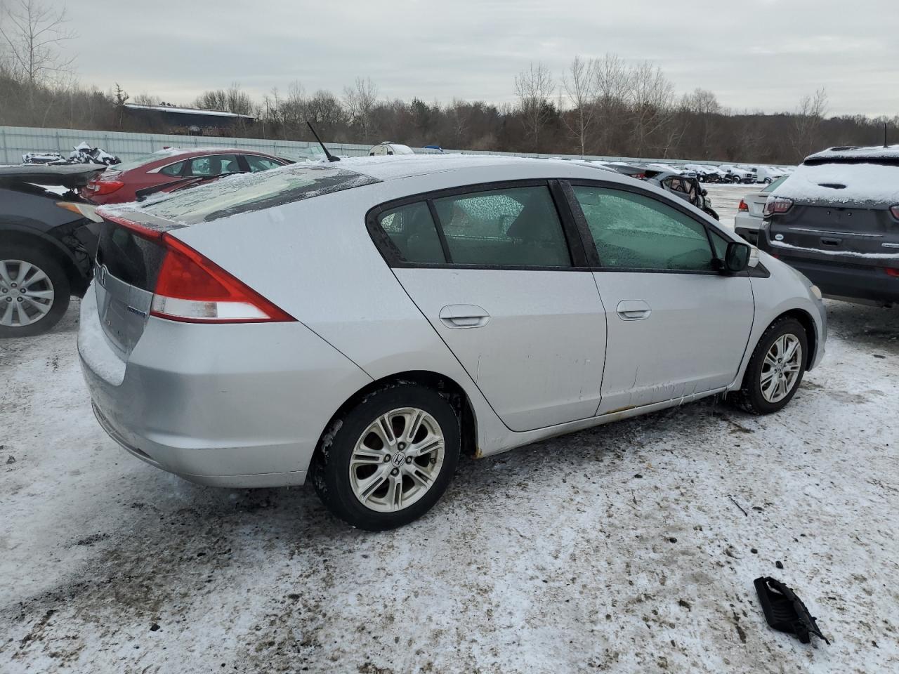 2010 Honda Insight VIN JHMZE2H71AS009851 Copart auction photo, front end / minor dent/scratches damage thumbnail 3