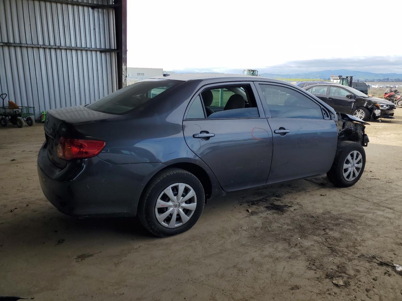 2009 Toyota Corolla VIN 1NXBU40E29Z107052 Copart auction photo, front end / side damage thumbnail 3
