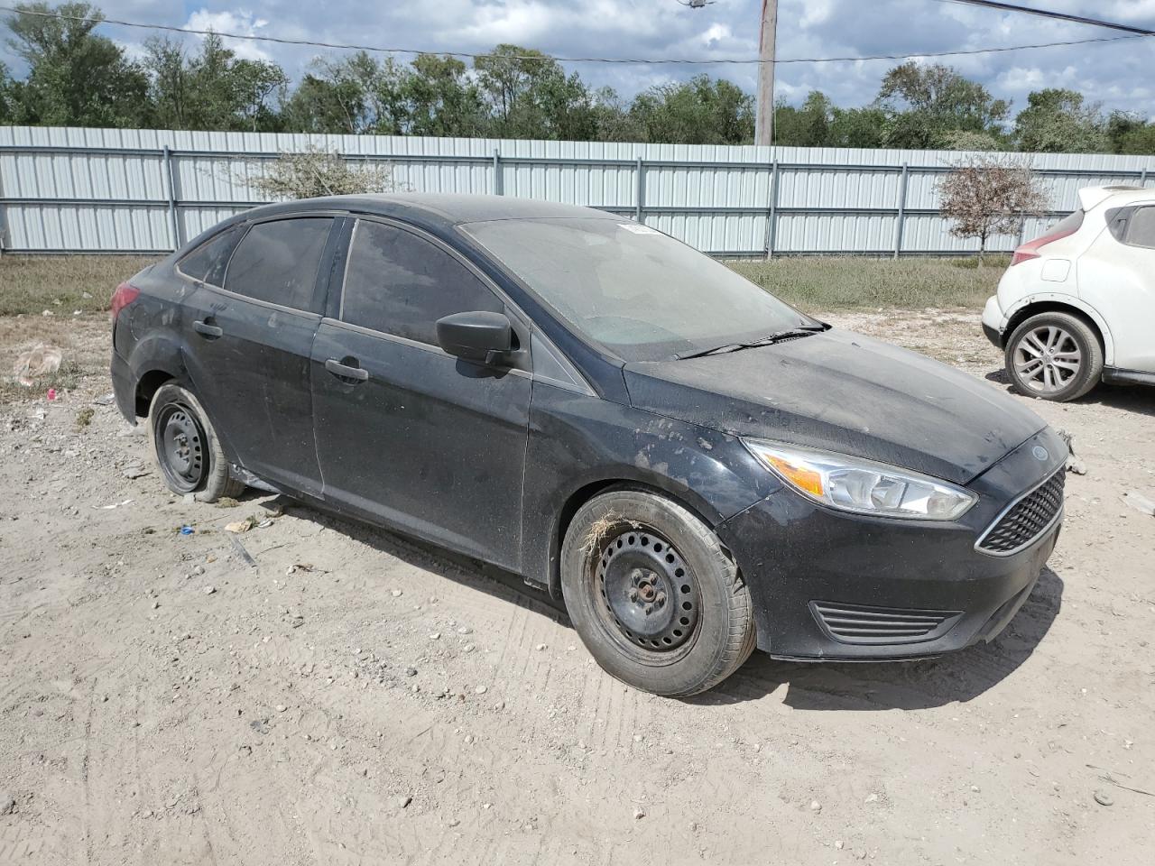 2017 Ford Focus VIN 1FADP3E22HL324284 Copart auction photo, side / front end damage thumbnail 4