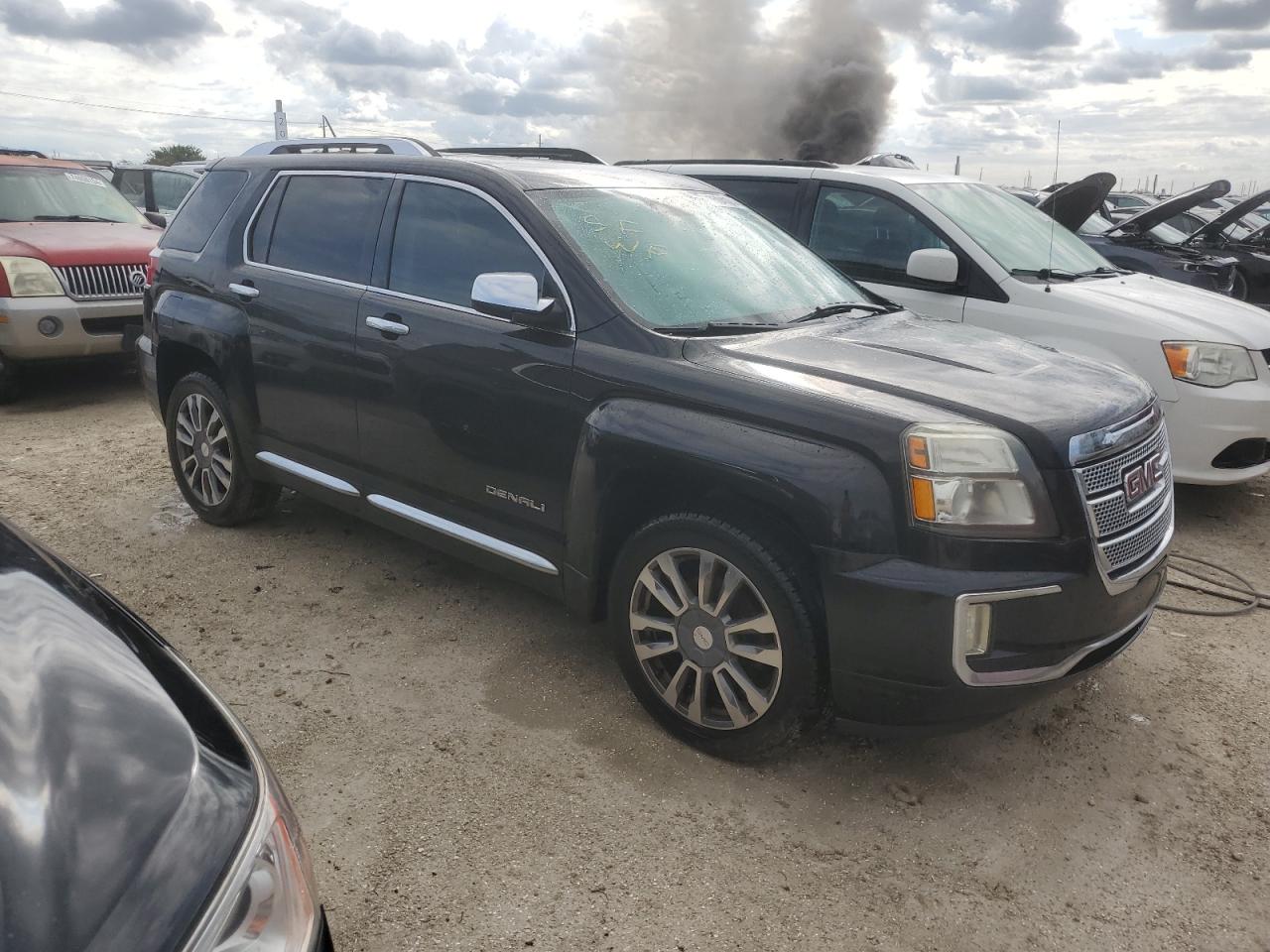 2016 GMC Terrain VIN 2GKFLRE33G6161361 Copart auction photo, water/flood / minor dent/scratches damage thumbnail 4
