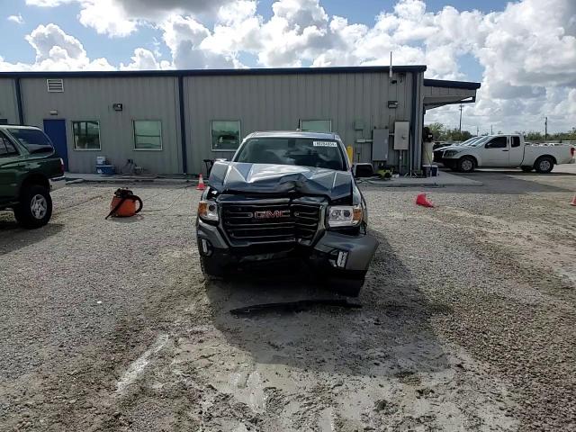 2021 GMC Canyon VIN 1GTG6FEN9M1186142 Copart auction photo, front end damage thumbnail 13