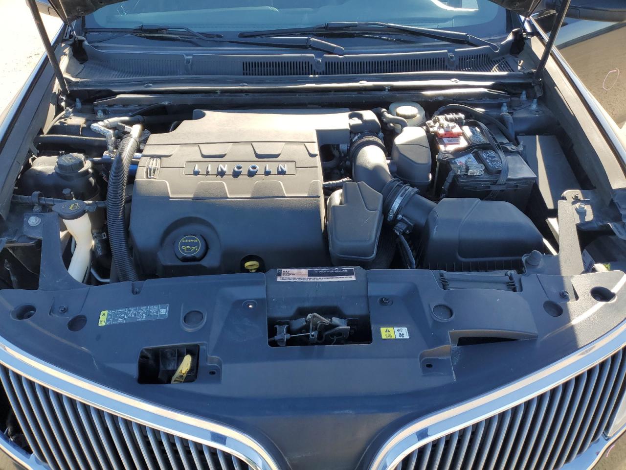 2013 Lincoln MKS VIN 1LNHL9DK1DG615434 Copart auction photo, front end / side damage thumbnail 11