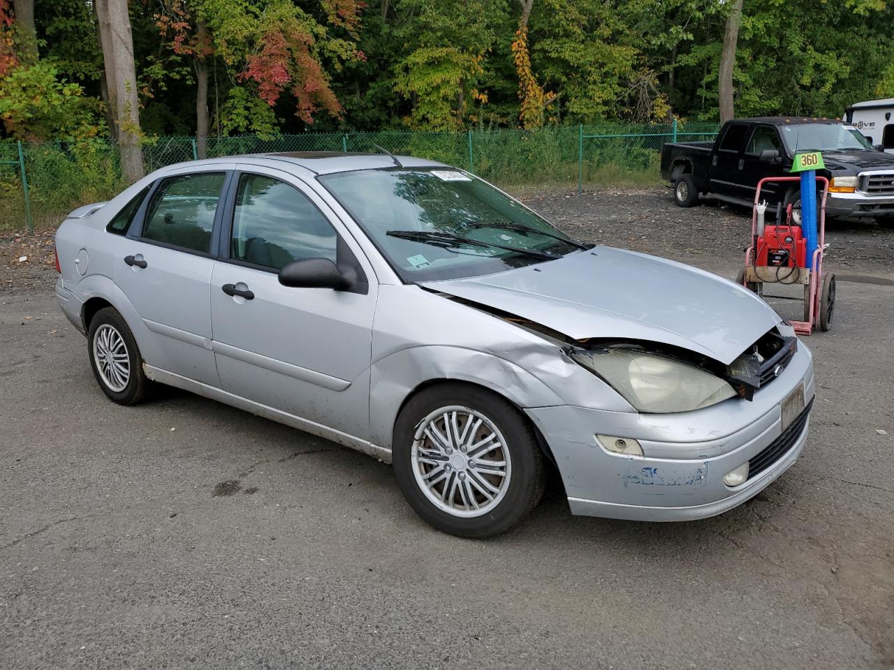 2004 Ford Focus VIN 1FAFP38Z54W119293 Copart auction photo, front end / minor dent/scratches damage thumbnail 4