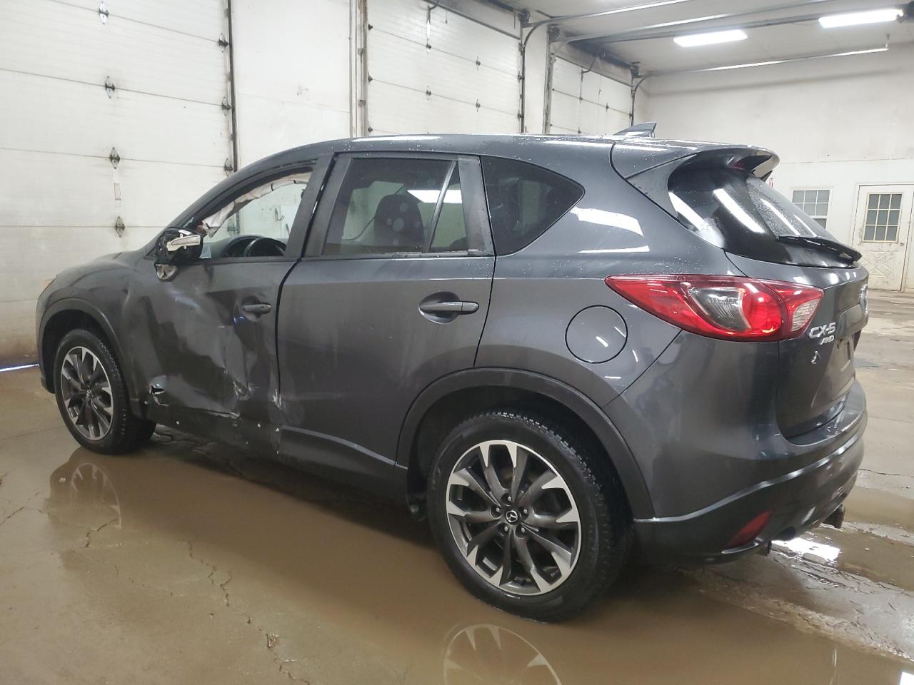 2016 Mazda CX-5 VIN JM3KE4DY8G0873109 Copart auction photo, side / minor dent/scratches damage thumbnail 2