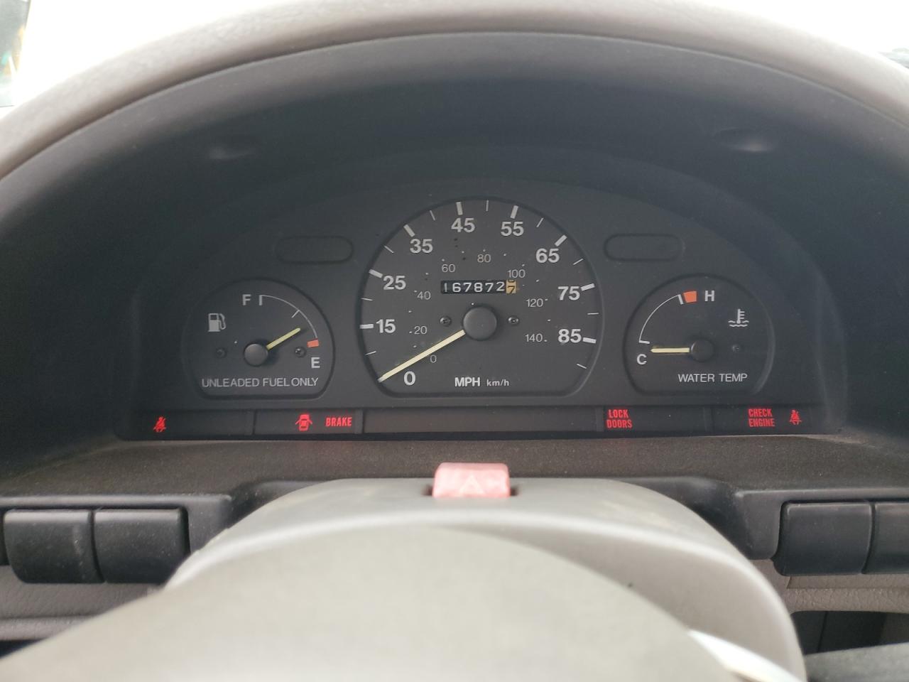 1993 GEO Metro VIN 2C1MR6469P6700123 Copart auction photo, minor dent/scratches damage thumbnail 9