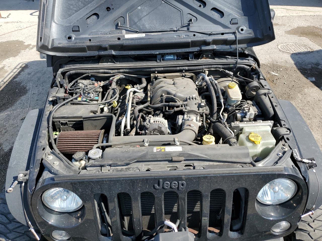 2016 Jeep Wrangler VIN 1C4AJWAG0GL110748 Copart auction photo, side damage thumbnail 11
