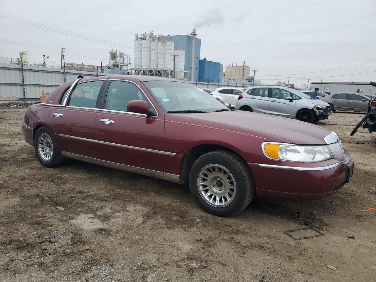 1998 Lincoln Town Car VIN 1LNFM83W1WY716196 Copart auction photo, rear end damage thumbnail 4