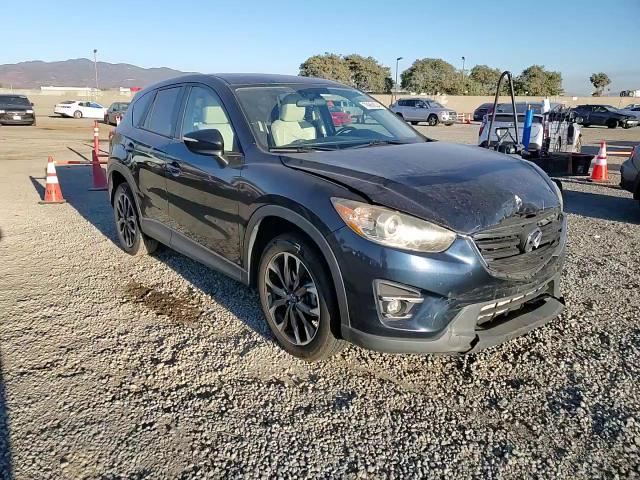2016 Mazda CX-5 VIN JM3KE2DY5G0685779 Copart auction photo, front end / minor dent/scratches damage thumbnail 12