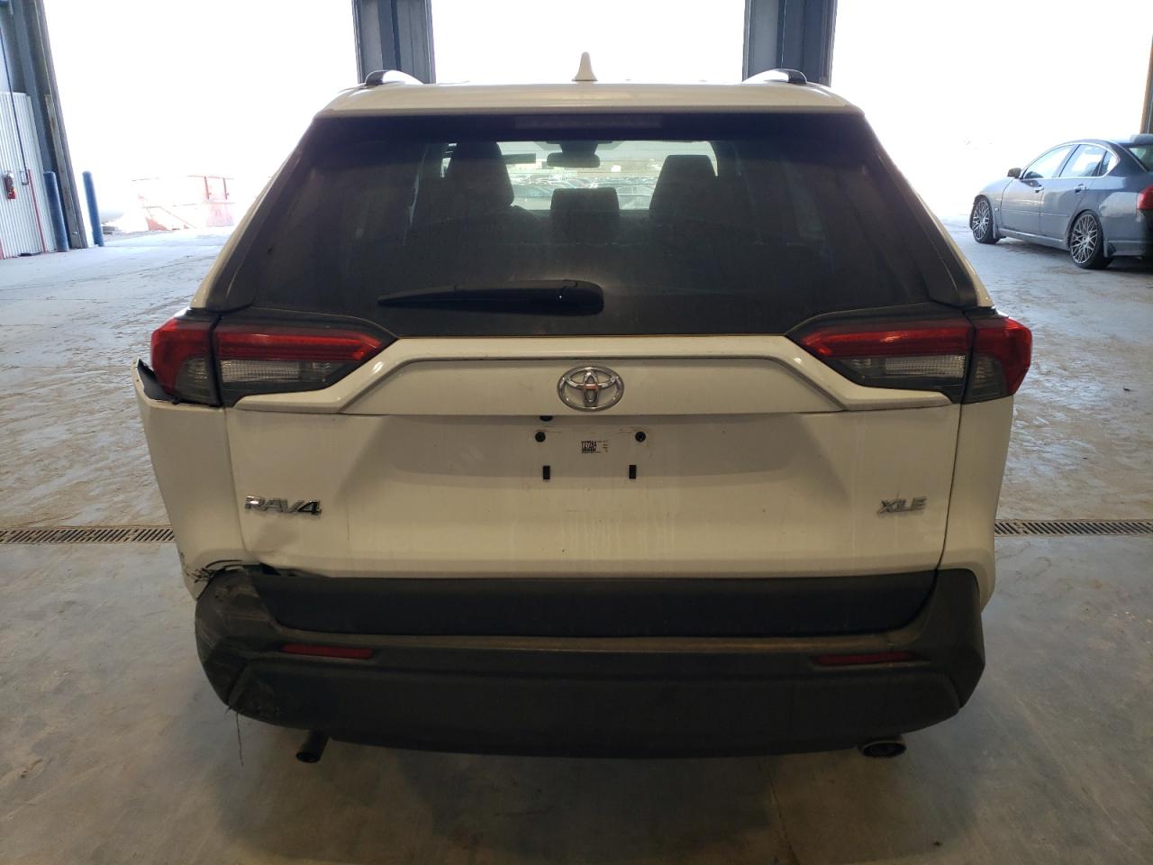 2021 Toyota RAV 4 VIN 2T3W1RFV8MC114412 Copart auction photo, front end / rear end damage thumbnail 6