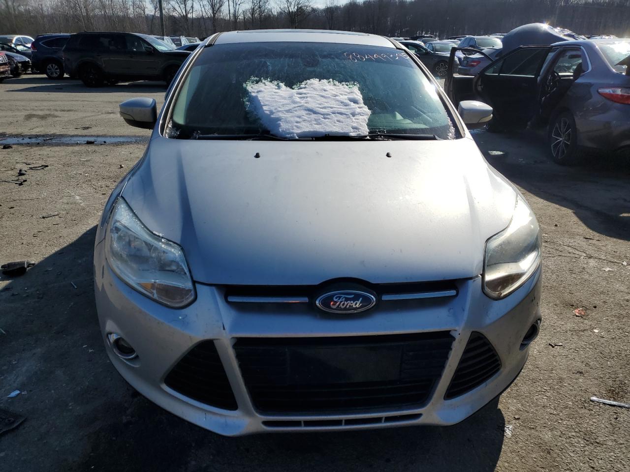 2012 Ford Focus VIN 1FAHP3M20CL220971 Copart auction photo, side / rear end damage thumbnail 5