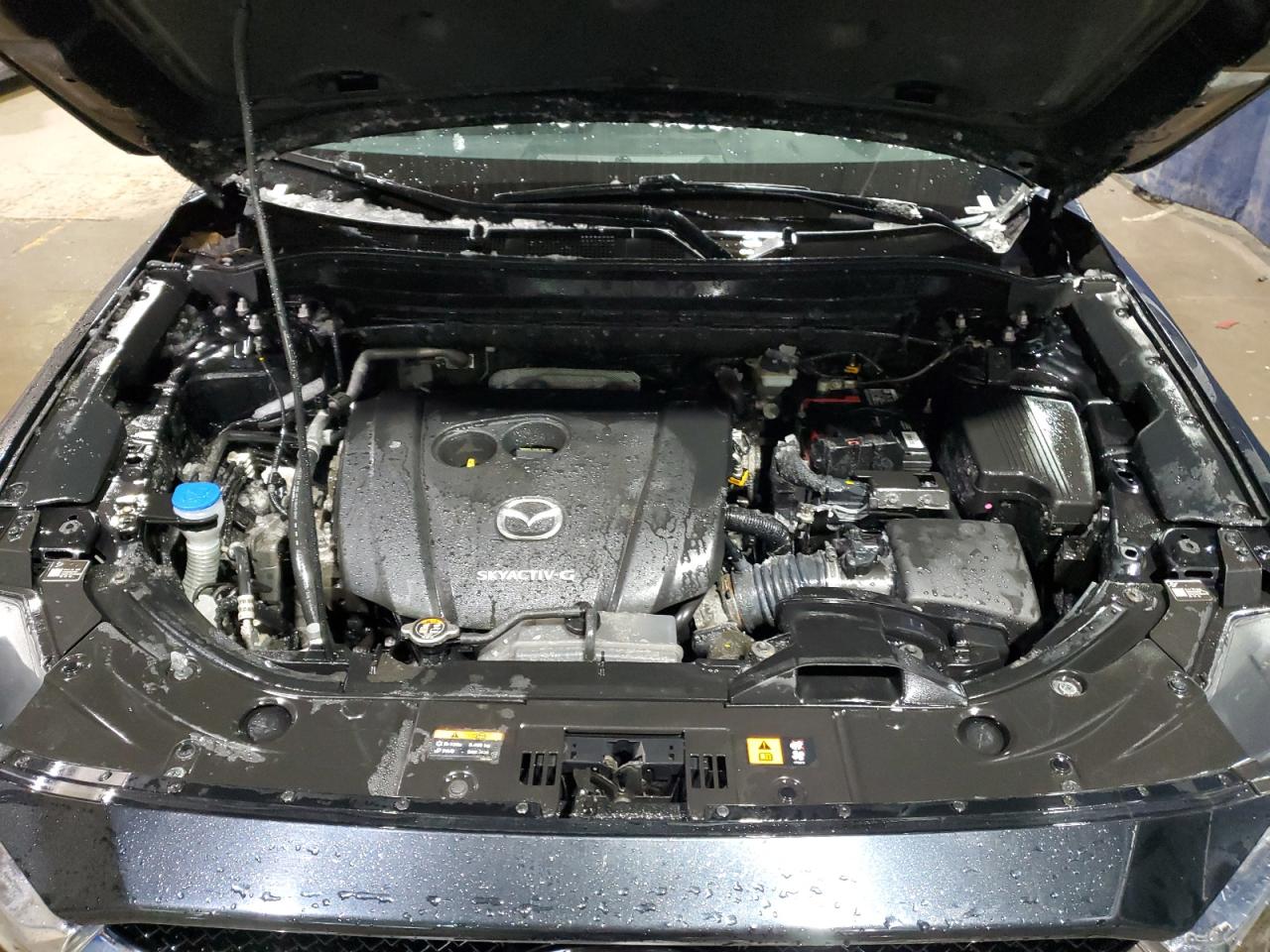 2021 Mazda CX-5 VIN JM3KFBCM0M0337718 Copart auction photo, rear end / minor dent/scratches damage thumbnail 12