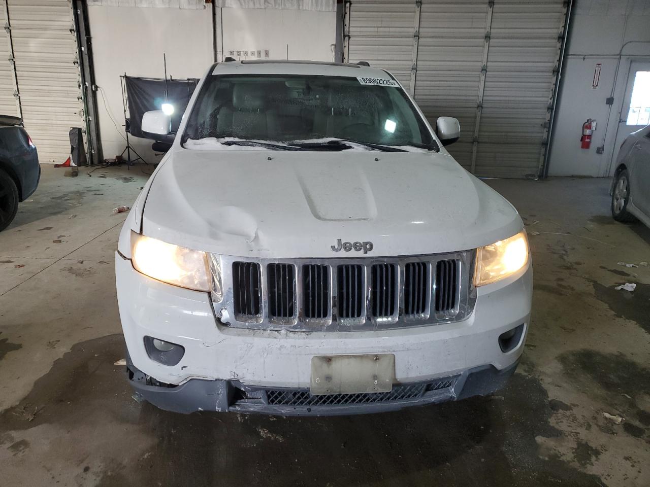 2013 Jeep Grand Cherokee VIN 1C4RJFAG7DC581388 Copart auction photo, front end damage thumbnail 5