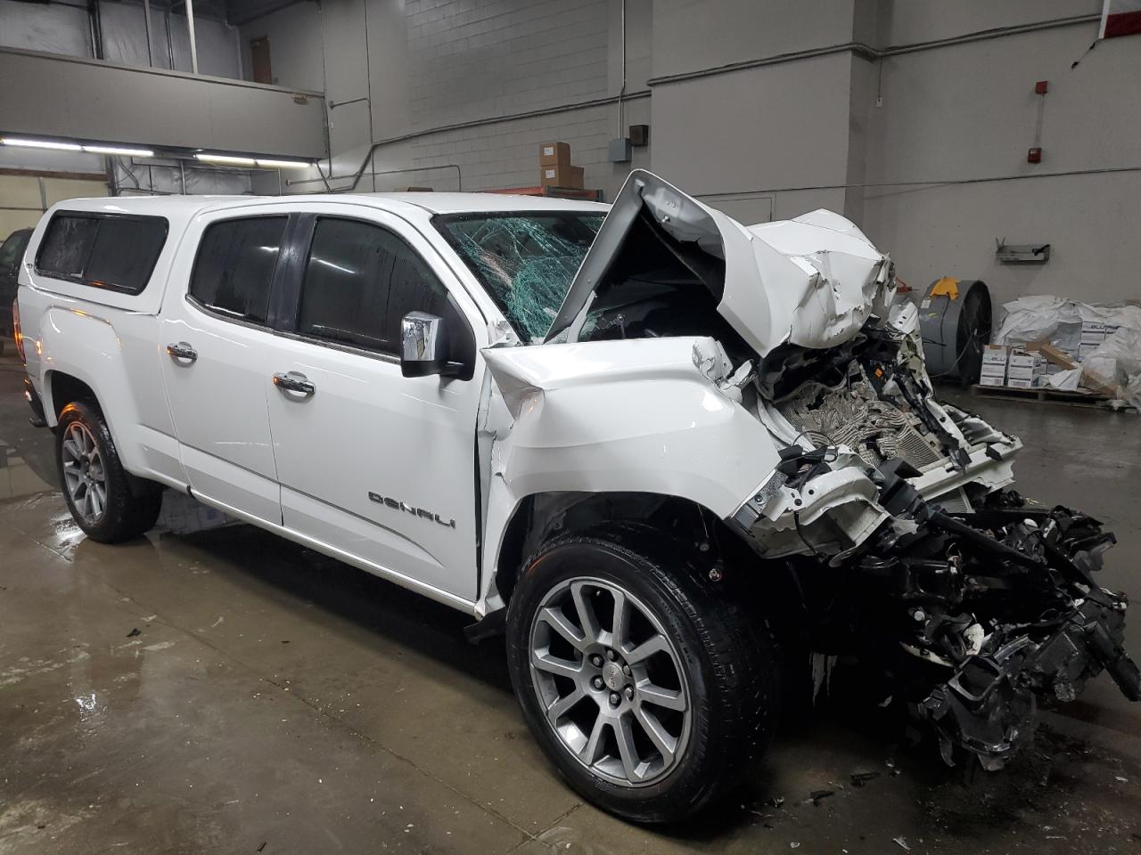 2022 GMC Canyon VIN 1GTG6EEN3N1318081 Copart auction photo, front end / side damage thumbnail 4